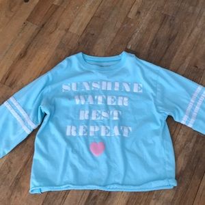 Blue long sleeved shirt